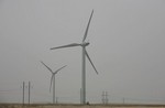 BAICHENG, CHINA - APRIL 20:  Wind turbines are...