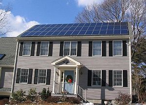 Photovoltaic solar panels on the roof of a hou...